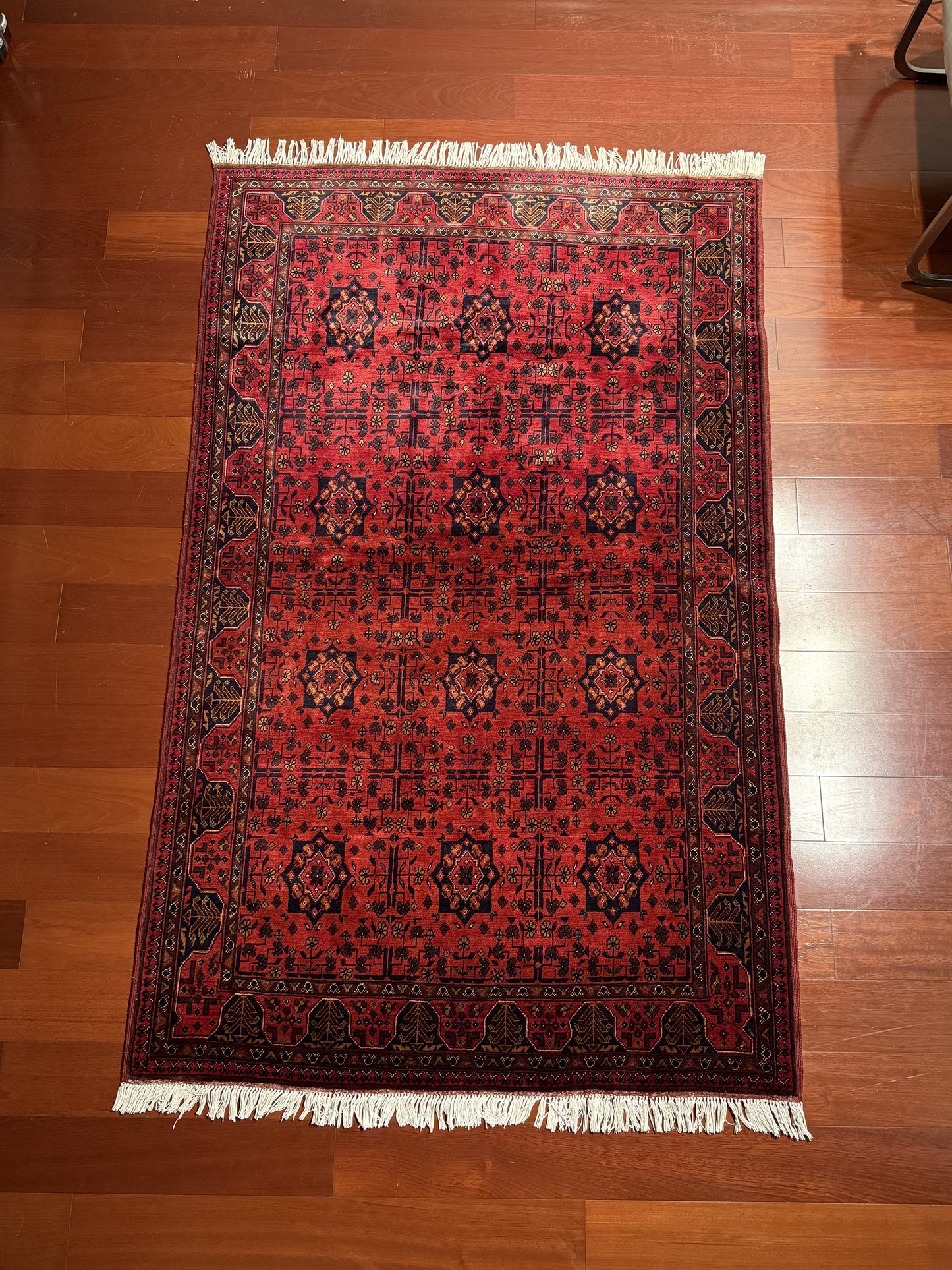 Vibrant Red and Intricate Afghan Rug