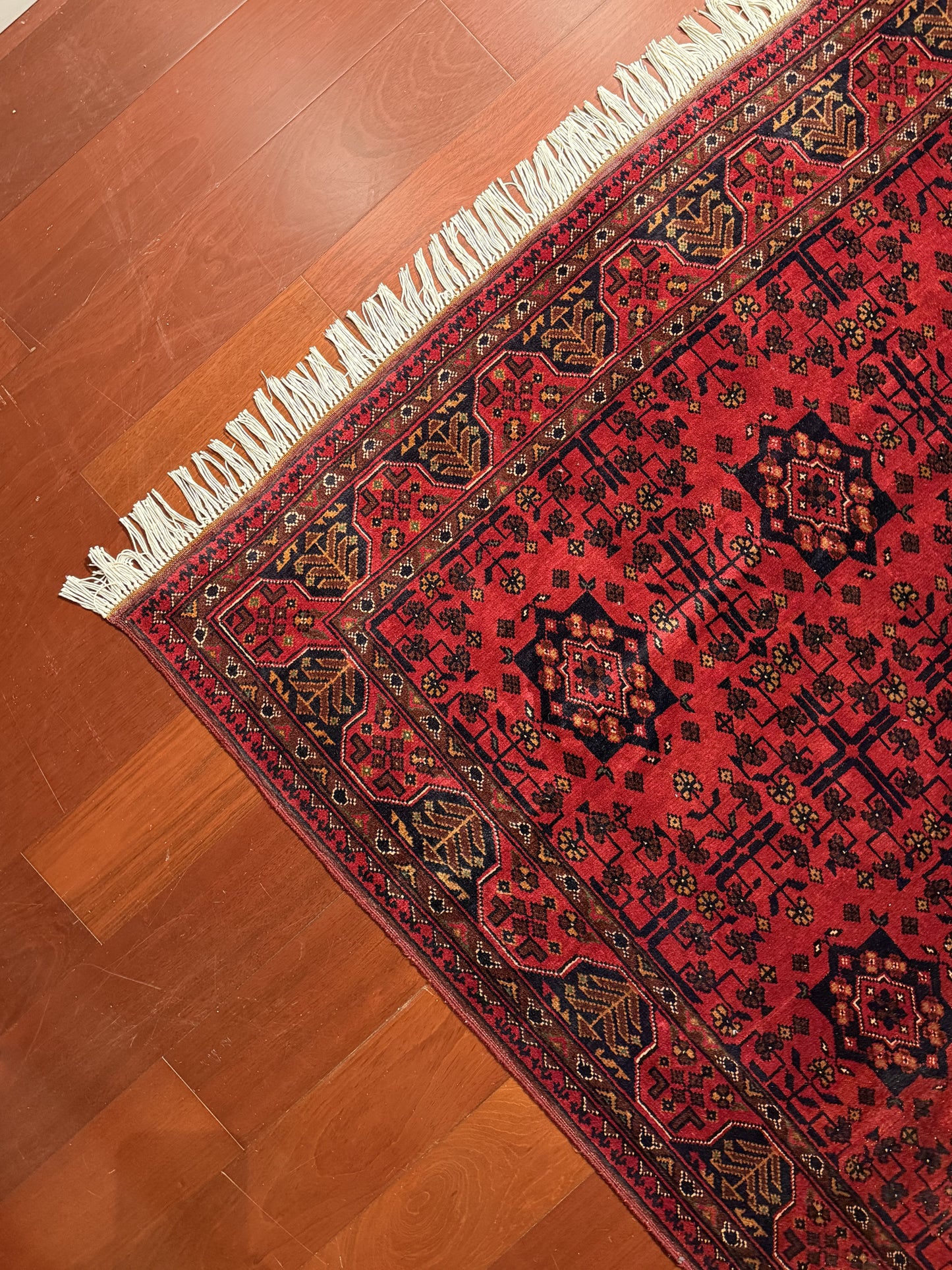 Vibrant Red and Intricate Afghan Rug