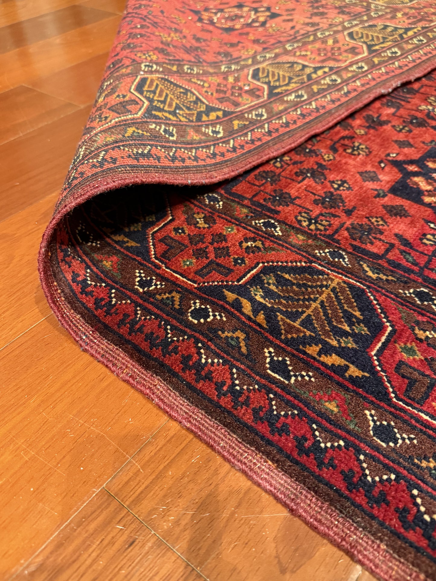 Vibrant Red and Intricate Afghan Rug